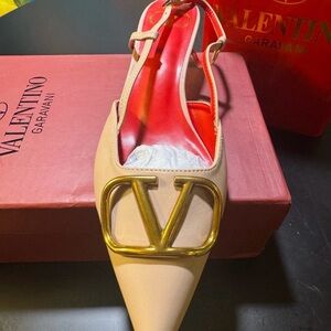 Valentino Garavani Beige Heels with Gold Emblem